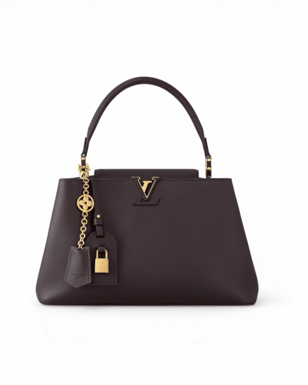 Louis vuitton bolso capucines mm negro, asa superior con dije colgante