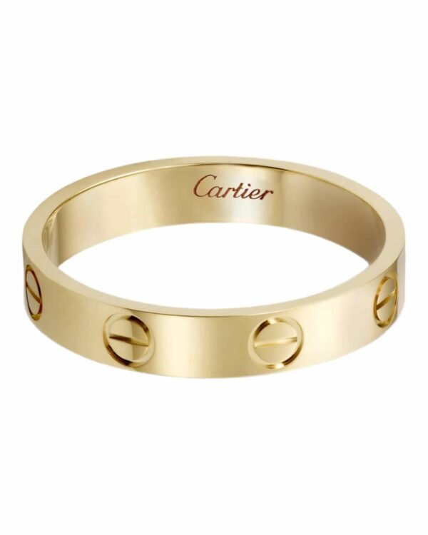 Cartier anillo love dorado, banda con motivo de tornillos grabados