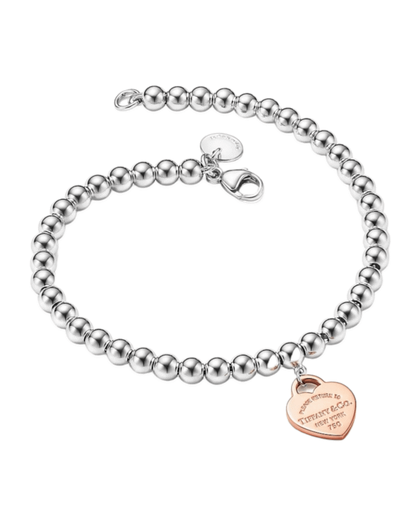 Photoroom_000_20240623_115357.png Tiffany brazalete return to corazon, cadena de perlas plateadas con dije rosado