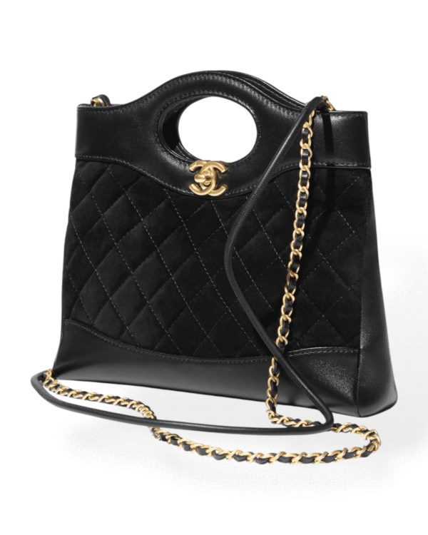 Chanel bolso mini 31 negro, mitad acolchada y mitad lisa con asa cutout