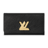 Louis Vuitton billetera twist negra, superficie acanalada con broche dorado