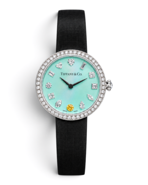 AAB00F45-210E-4C5E-9D51-A5C1A97F19D1 Tiffany & Co. Eternity Celeste Liso: esfera celeste claro lisa con piedras brillantes y una piedra amarilla a las 6, bisel plateado con brillos
