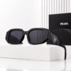 Prada Lentes de sol Geométrico
